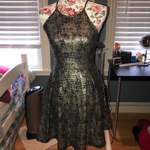 Gold and black halter neck dress